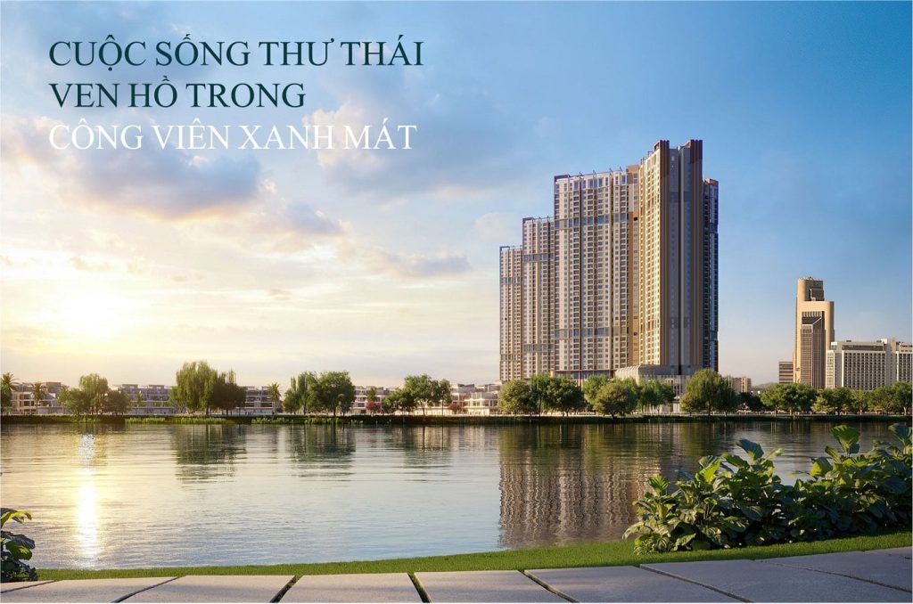Tân Á Đại Thành - Chủ đầu tư dự án Galia Hanoi 6 Phối cảnh dự án Galia Hanoi với tòa nhà cao tầng hiện đại bên hồ nước lớn, xung quanh là công viên cây xanh và các dãy nhà thấp tầng, ánh sáng bình minh tạo nên khung cảnh yên bình và sang trọng.